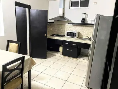 Una cocina o zona de cocina en Departamento Gaviotas