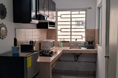 Una cocina o zona de cocina en Alojamiento cómodo en Lomas de San Isidro