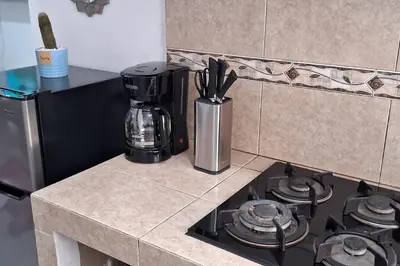 Una cocina o zona de cocina en Alojamiento cómodo en Lomas de San Isidro