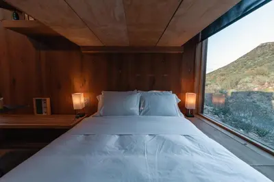 Cama o camas de una habitación en Wander Cabins Artega