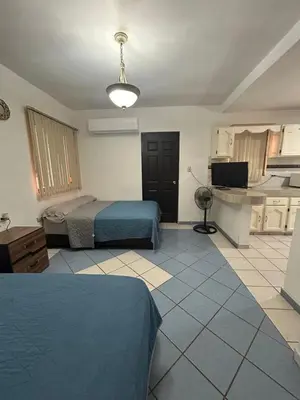 Cama o camas de una habitación en Hotel Leticia