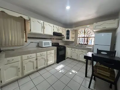 Una cocina o zona de cocina en Hotel Leticia