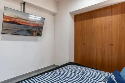 Cama o camas de una habitación en Lujo y Comodidad Frente al Mar en Torre Catania