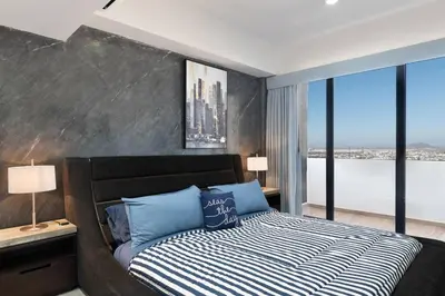 Cama o camas de una habitación en Lujo y Comodidad Frente al Mar en Torre Catania