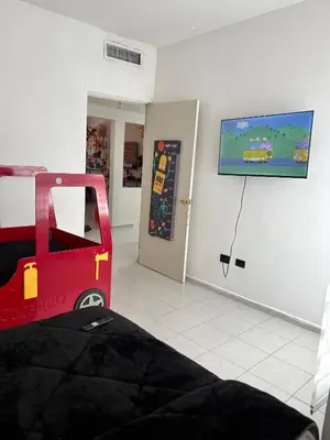 Cama o camas de una habitación en Casa completa, 4 dormitorios, 7 camas dobles, 3 sofá cama, 3 baños 1 en planta baja, cocina equipada, consola Arcade, asador, juguetes para niños, plancha, secadora, cafetera, etc, fraccionamiento privado, zona de vías rápidas y toallas