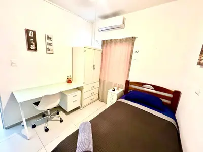 Cama o camas de una habitación en Departamento 2 Habitaciones Cas Consulado Centenario
