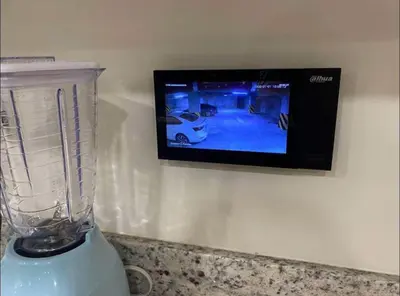 Una televisión o centro de entretenimiento en Departamento a pie de playa con alberca infinty en piso 22