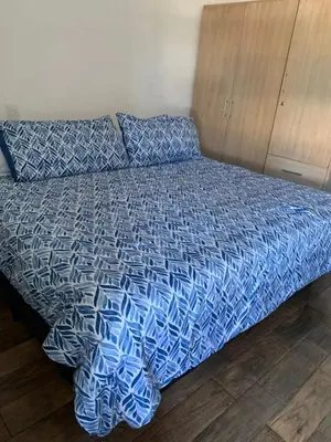 Cama o camas de una habitación en Condominio Mar y Arena
