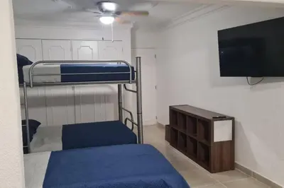 Cama o camas de una habitación en Casa 16 personas 7 cuadras playa