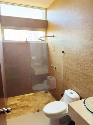 Un baño de Departamento Flamingo del Lago - 1 Min Malecón