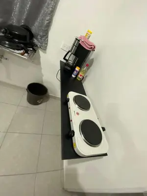 Una cocina o zona de cocina en Departamento privado con piscina