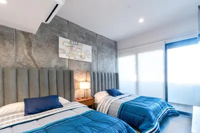 Cama o camas de una habitación en Stylish Stay in the heart of the Mazatlán Malecon