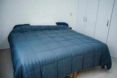 Cama o camas de una habitación en Alejandria Mazatlan Vacation Rental