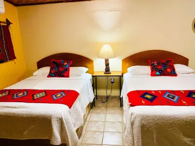 Cama o camas de una habitación en Iguana Inn