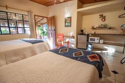 Cama o camas de una habitación en Iguana Inn