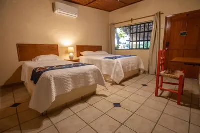 Cama o camas de una habitación en Iguana Inn