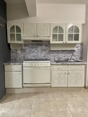 Una cocina o zona de cocina en Cómodo y agradable departamento con estacionamiento y portón eléctrico