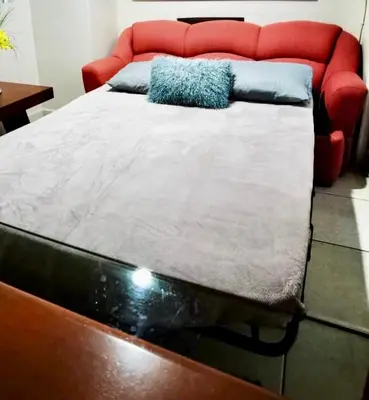 Cama o camas de una habitación en Cómodo y agradable departamento con estacionamiento y portón eléctrico