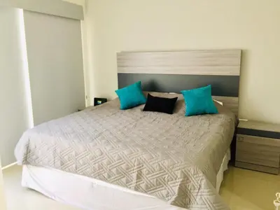 Cama o camas de una habitación en Apartamento en PB con piscina a poca distancia de la playa