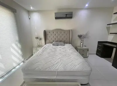 Cama o camas de una habitación en Casa en renta cuarto