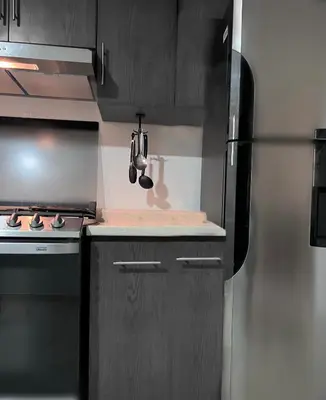 Una cocina o zona de cocina en loft residencial enLosMochis