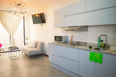 Una cocina o zona de cocina en Loft a 3 cuadras de la playa by G P S rentas