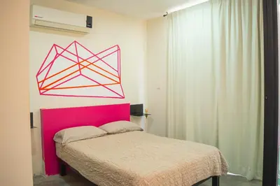 Cama o camas de una habitación en Loft a 3 cuadras de la playa by G P S rentas