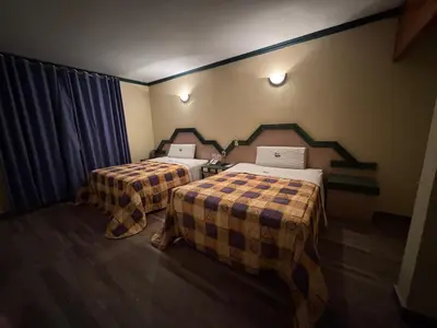 Cama o camas de una habitación en Motel El Peñon