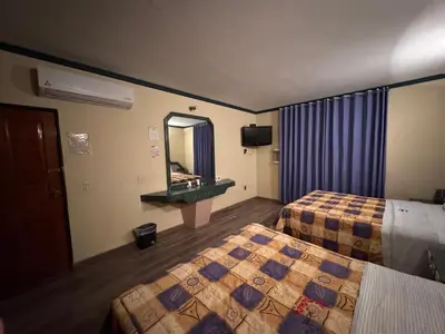 Cama o camas de una habitación en Motel El Peñon