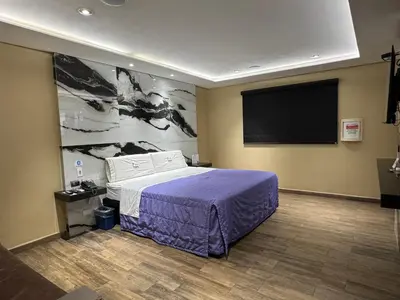 Cama o camas de una habitación en Motel El Peñon