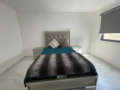 Cama o camas de una habitación en Beautiful House