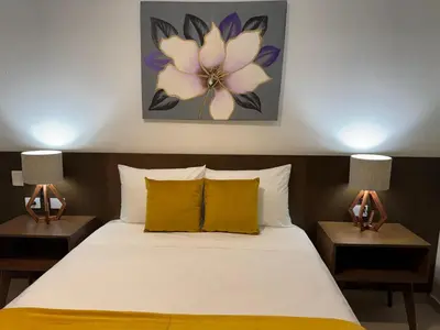 Cama o camas de una habitación en Hotel Faava