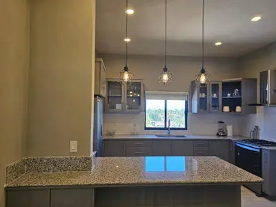 Una cocina o zona de cocina en Hermoso Penthouse