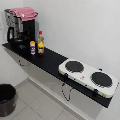 Una cocina o zona de cocina en Departamento Privado con Piscina