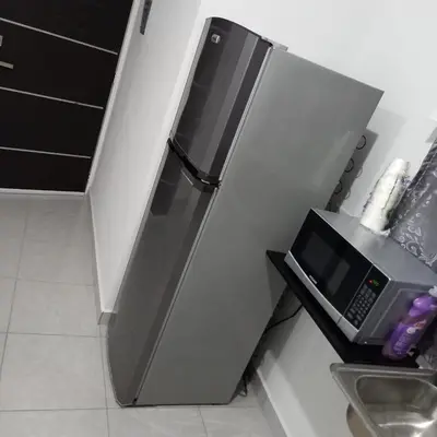 Una cocina o zona de cocina en Departamento Privado con Piscina