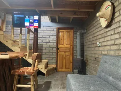 Zona de estar de Cabañas los Álamos 2 Creel