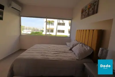Cama o camas de una habitación en Hermosos departamentos con laguna cristalina