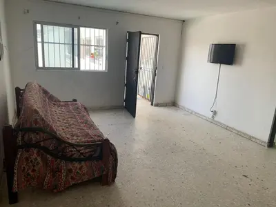 Una televisión o centro de entretenimiento en Torre Romo Departamento 4