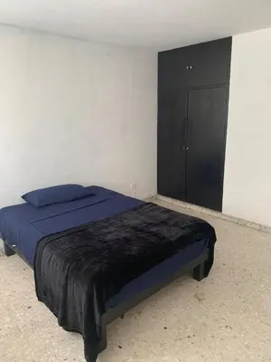 Cama o camas de una habitación en Torre Romo Departamento 4
