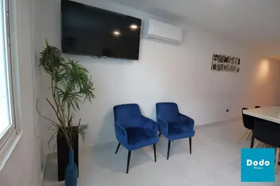 Una televisión o centro de entretenimiento en Departamentos en Mazatlán a pie de playa