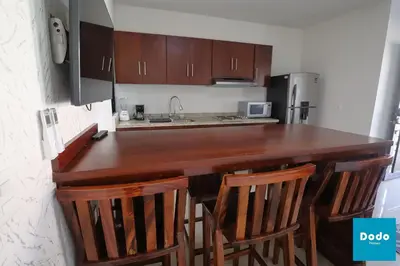 Una cocina o zona de cocina en Departamentos a 3 minutos de la playa