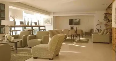 Una televisión o centro de entretenimiento en Condo de lujo en Mazatlan Peninsula