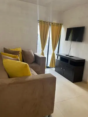 Una televisión o centro de entretenimiento en Minimalist House Equipped