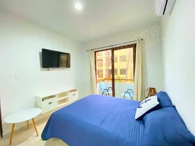 Una televisión o centro de entretenimiento en Condominio Oceanna 2