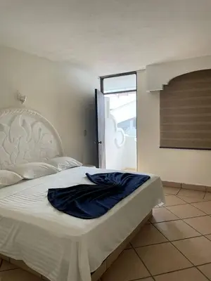 Cama o camas de una habitación en Hotel Vistamar