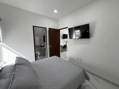 Una televisión o centro de entretenimiento en Departamento en Mazatlán - Lomas Del Mar