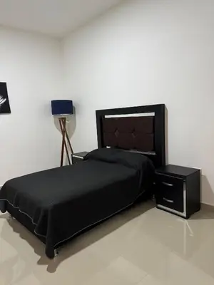 Cama o camas de una habitación en Faava Departamentos