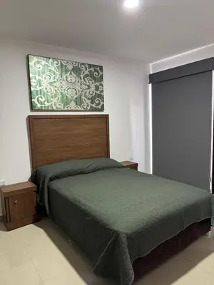Cama o camas de una habitación en Faava Departamentos