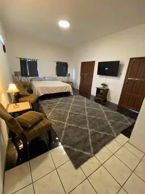 Cama o camas de una habitación en Casa Corazon de Alamos