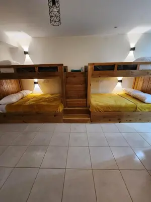 Cama o camas de una habitación en Hotel Bertis